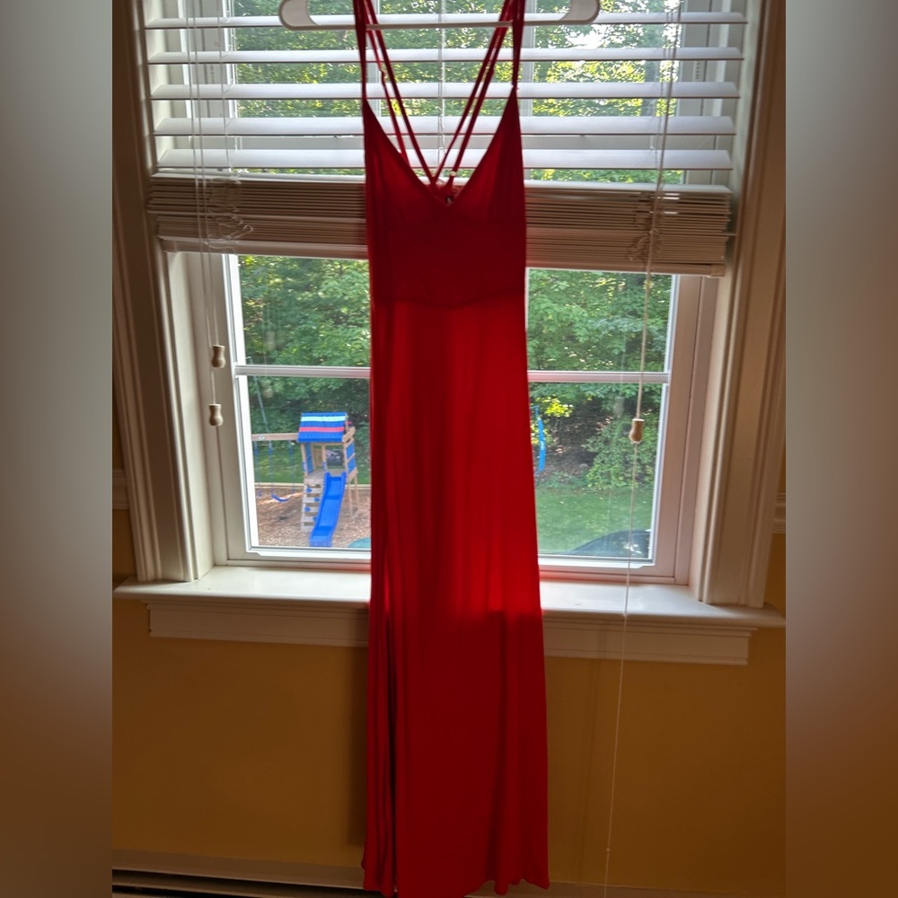 Form fitting red dress.